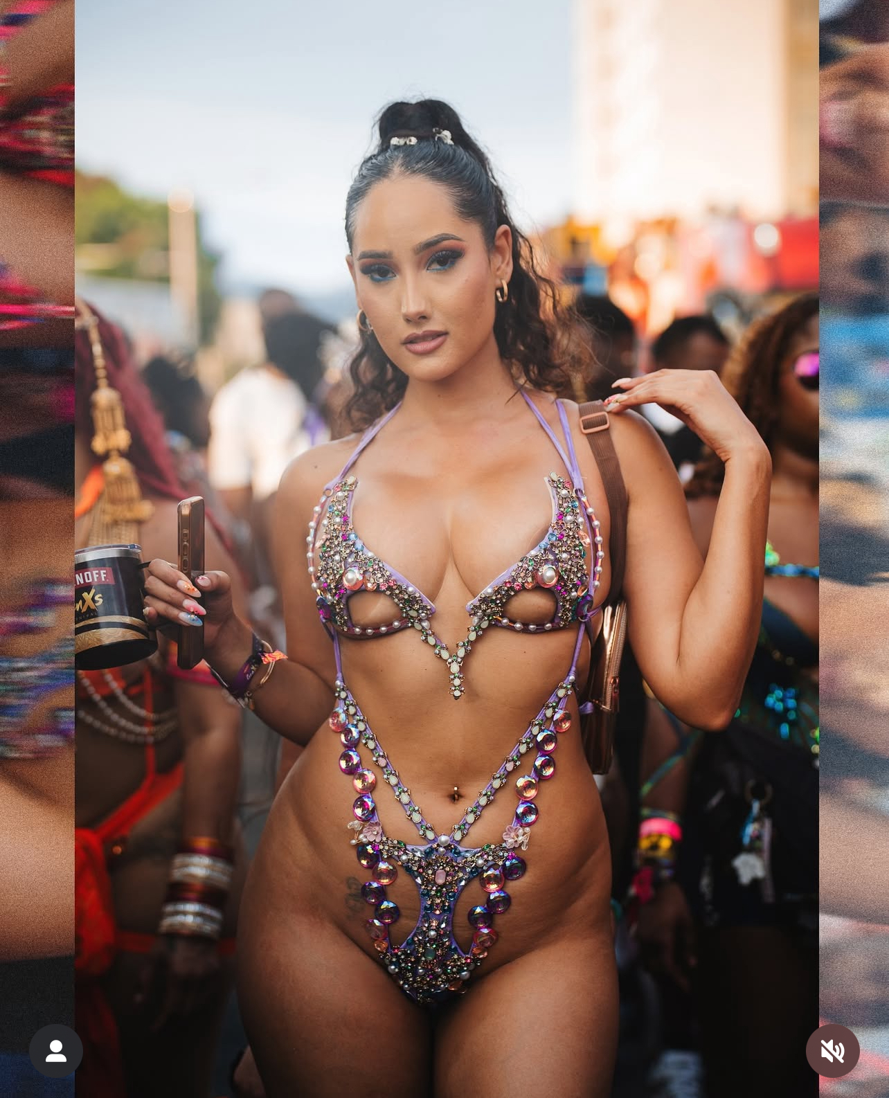 Masquerader posing in a Trinidad Carnival costume
